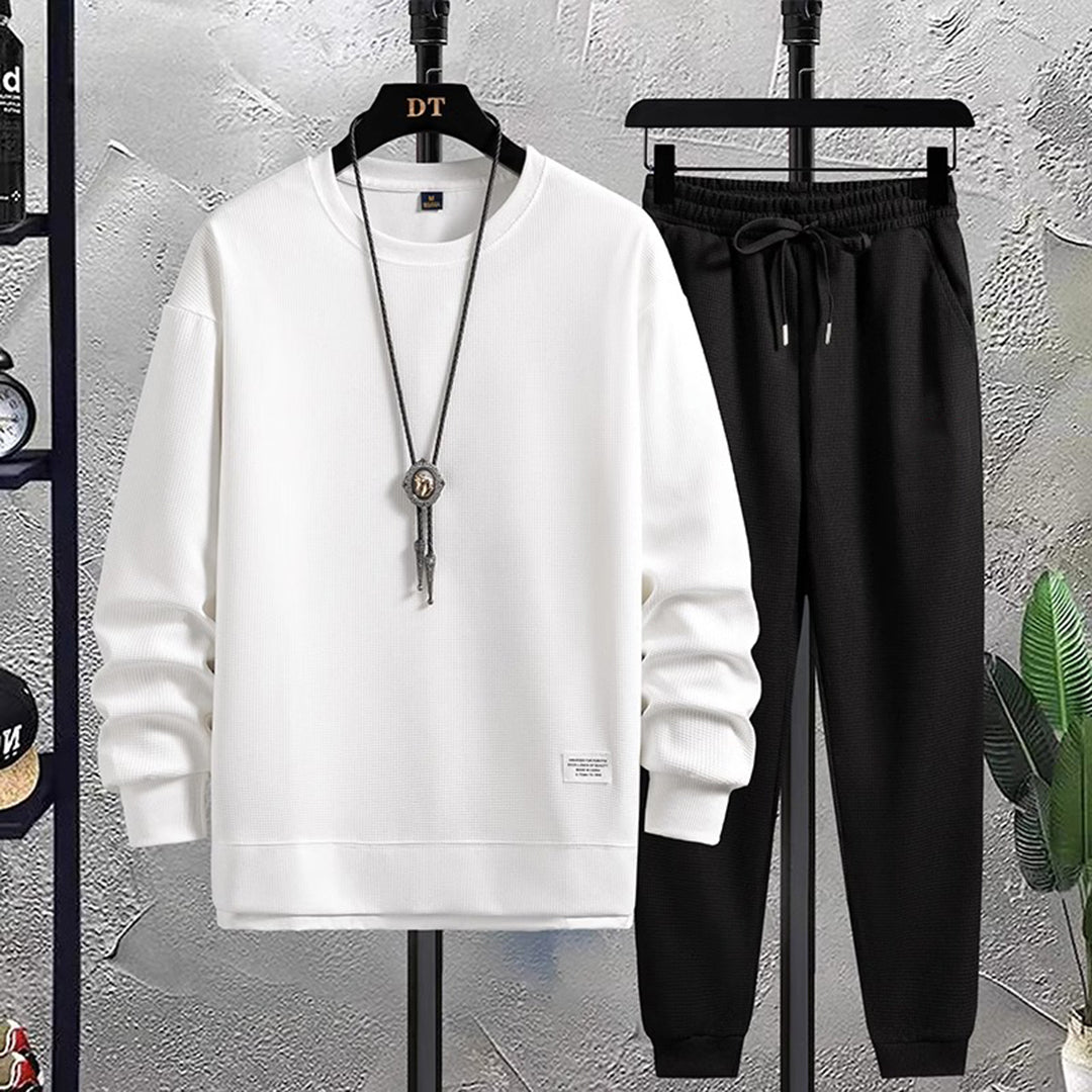 https://cdn.shopify.com/s/files/1/0673/3581/5471/files/JORDAN_-_Joggingpak_voor_heren.jpg?v=1733003073